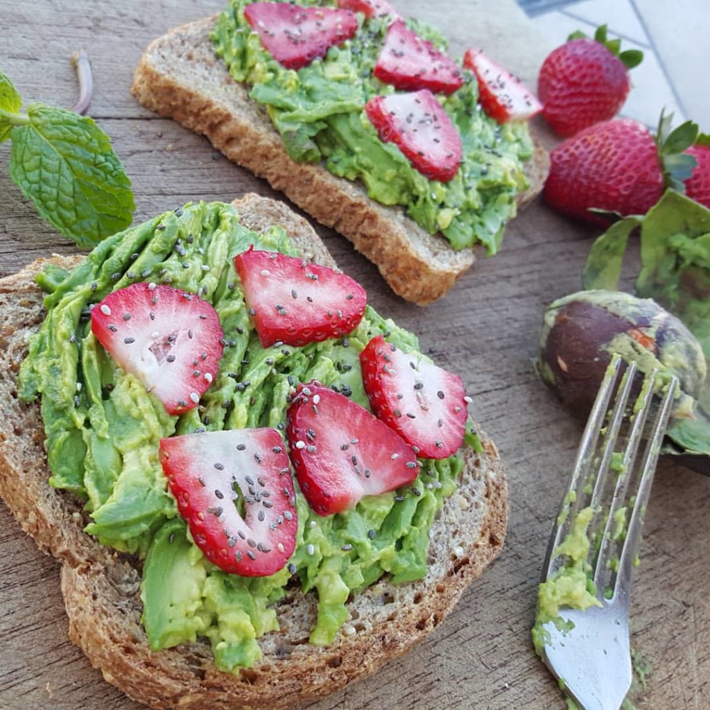 Grinch Toast Ezekiel Bread with Avocado Strawberries Chia Seeds https://cleanfoodcrush.com/grinch-toast/ ‎
