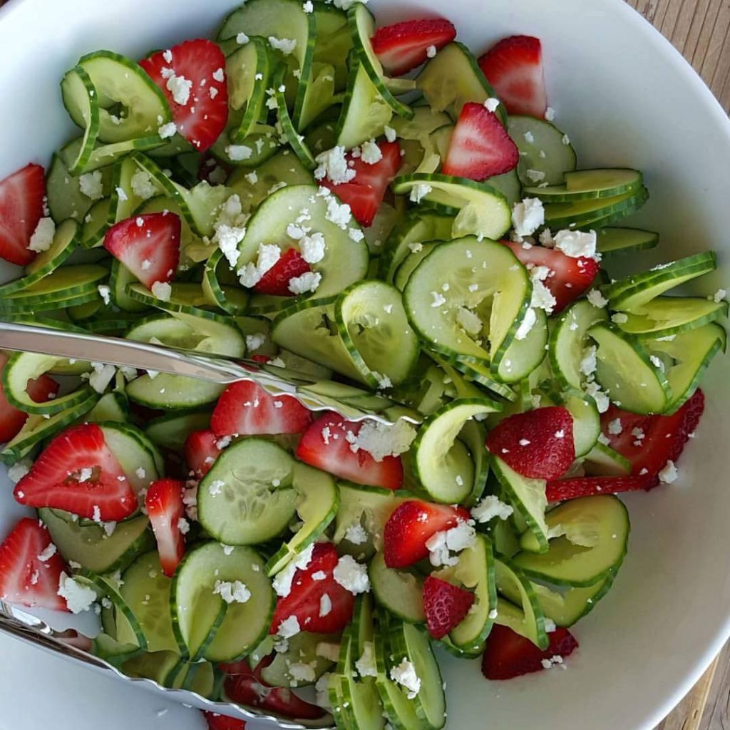 Cucumber strawberry salad with homemade poppyseed dressing clean