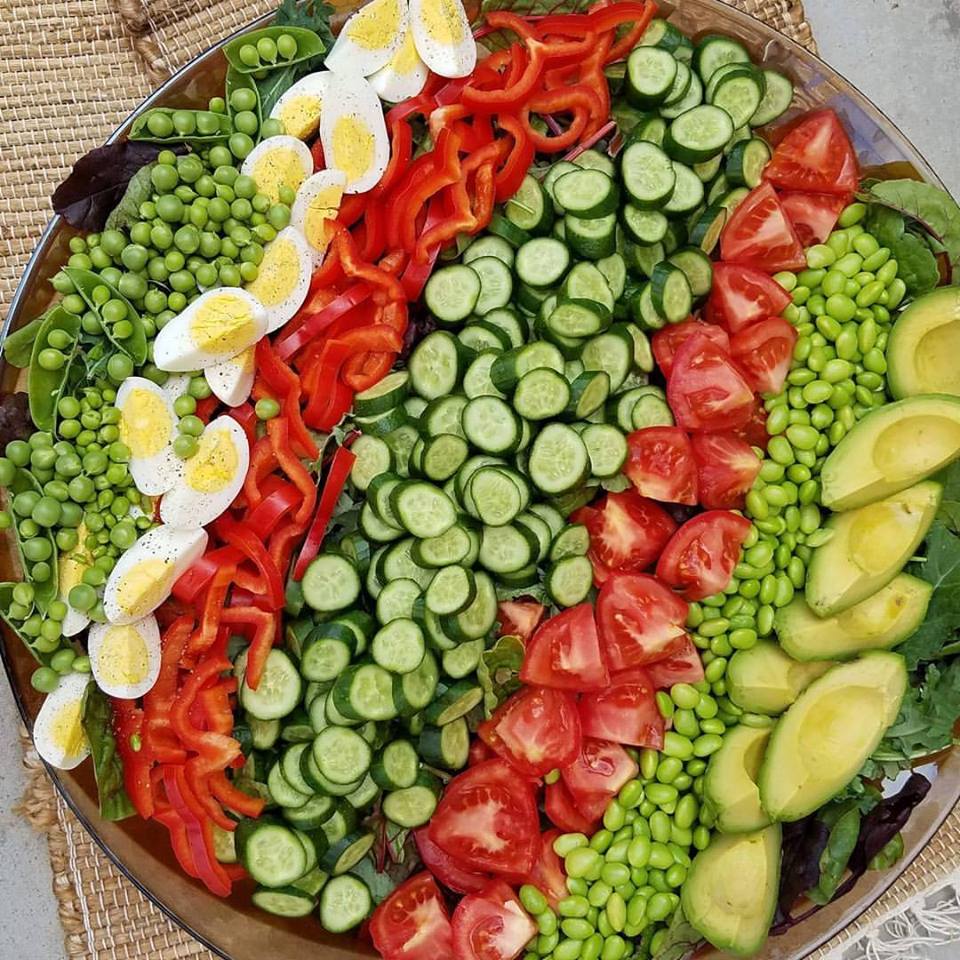 Fresh garden salad with creamy garlic dressing