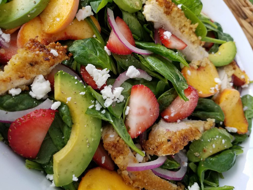 Crispy Quinoa Chicken & Strawberry Spinach Salad Clean Eating Recipe https://cleanfoodcrush.com/crispy-chicken-salad/