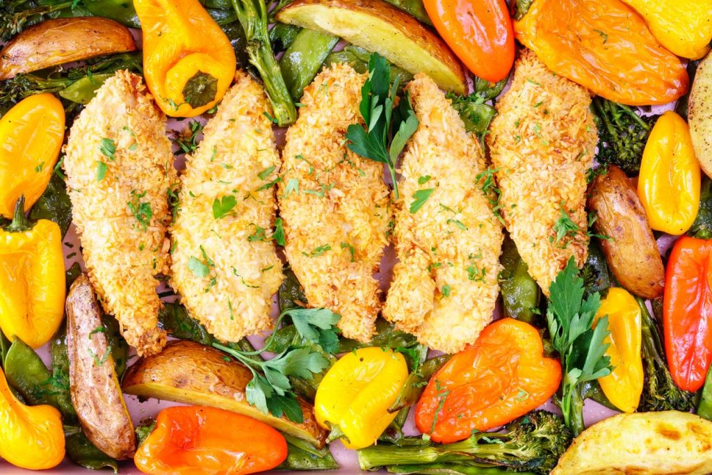 Coconut breaded chicken with broccoli and peppers