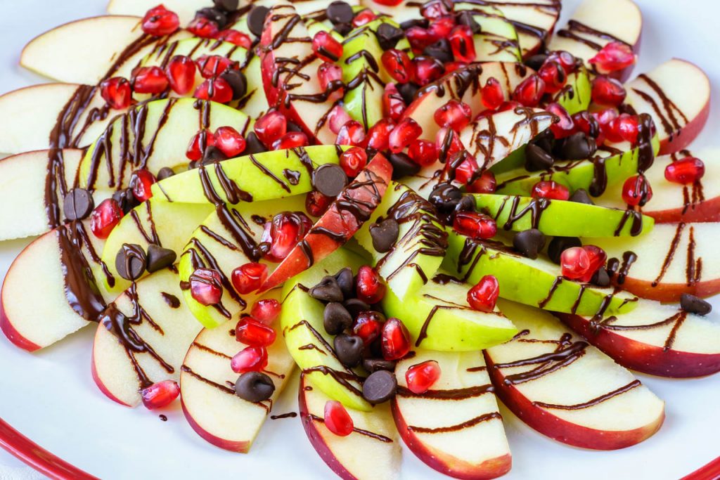 Pomegranate Chocolate and Apple Nachos plate snacks