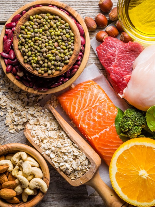 Selection of food that is good for the health and skin, rustic wood background