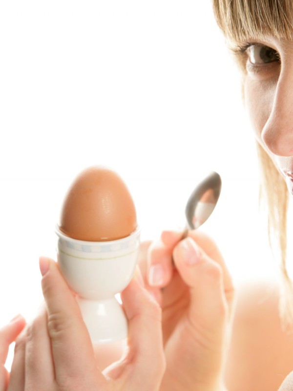 Girl Doing Clean Food Diet Holding An Egg