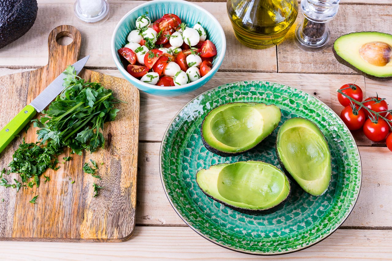 Clean Eating Caprese Stuffed Avocados are Amazing! | Clean Food Crush