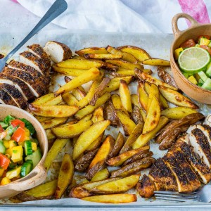 Clean Eating Sheet Pan Jerk Chicken with Baked Fries + Fresh Mango Salsa