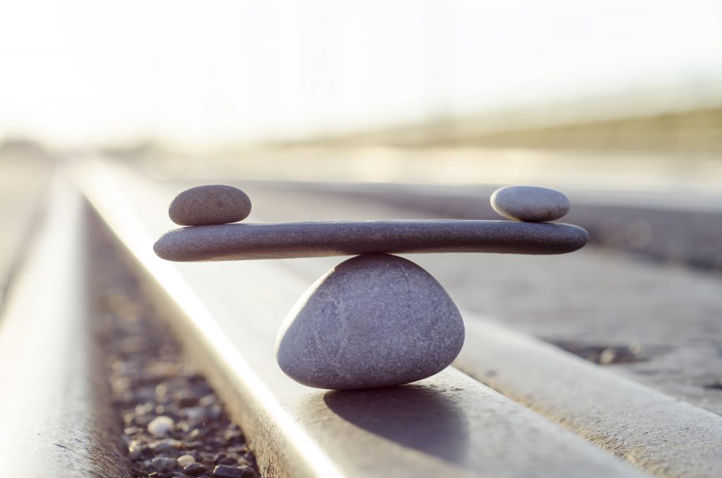 Stones are balanced on top of each other