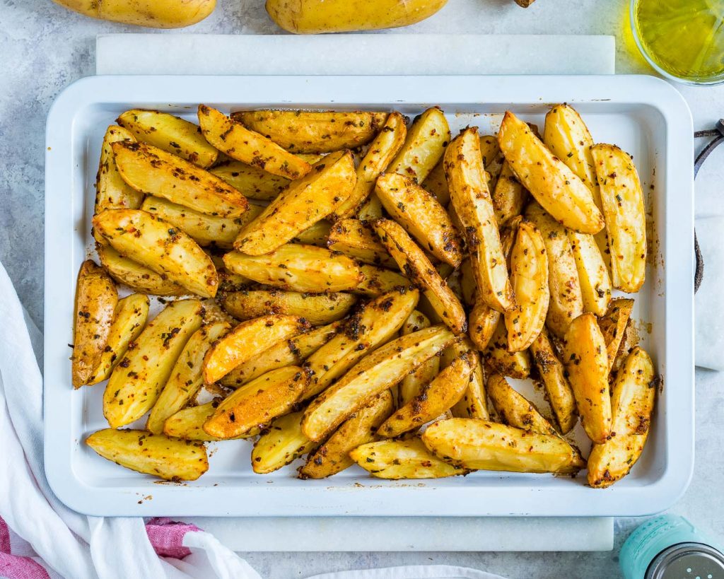 Eat Clean Spicy Garlicy Baked Potato Wedges