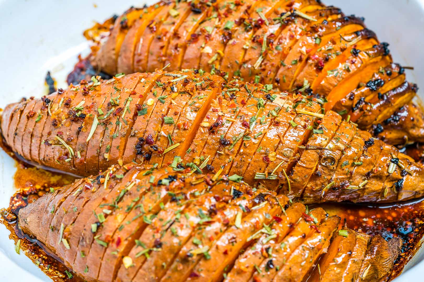 CleanFoodCrush Honey + Garlic Hasselback Sweet Potatoes