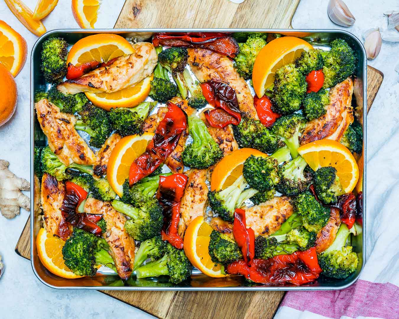 Try this Clean Eating Sheet Pan Orange + Ginger Chicken for Dinner