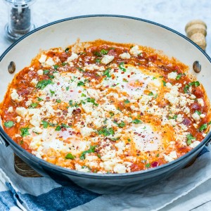 CleanFoodCrush Spicy Fire Roasted Poached Eggs with Feta recipe