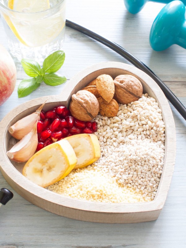Healthy food in heart and water diet sport lifestyle concept