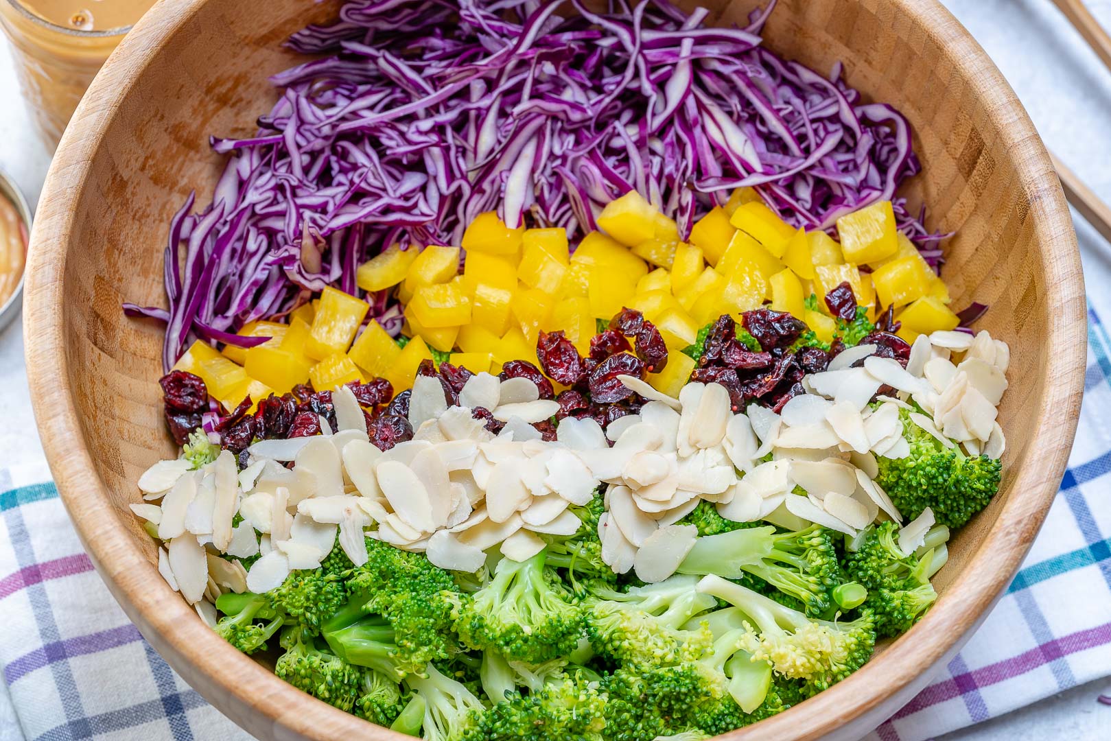 Clean Eats Broccoli Red Cabbage Salad with Tangy PB Dressing