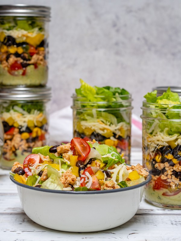 Fiesta Taco Salad-in-a-jar with Creamy Avocado + Cilantro Dressing by CleanFoodCrush