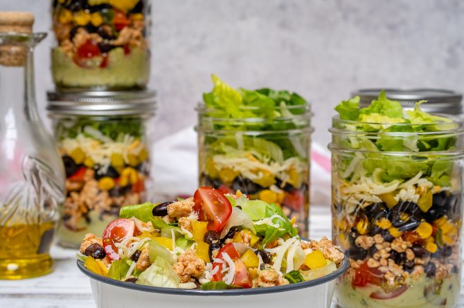 Fiesta Taco Salad-in-a-jar with Creamy Avocado + Cilantro Dressing by CleanFoodCrush