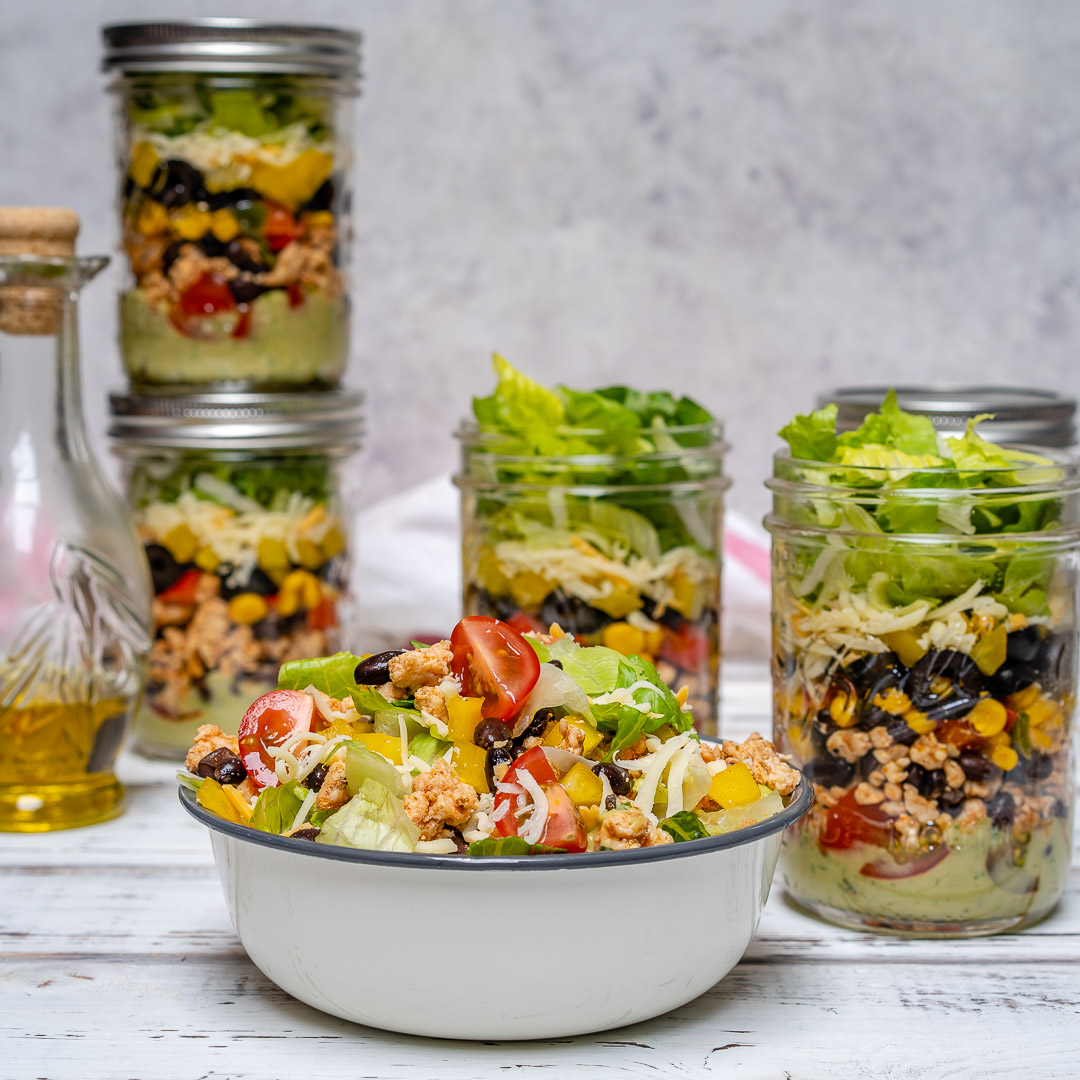 Fiesta Taco Salad-in-a-jar with Creamy Avocado + Cilantro Dressing by CleanFoodCrush