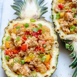 Pineapple chicken bowls; Pineapple chicken stuffed pineapples.
