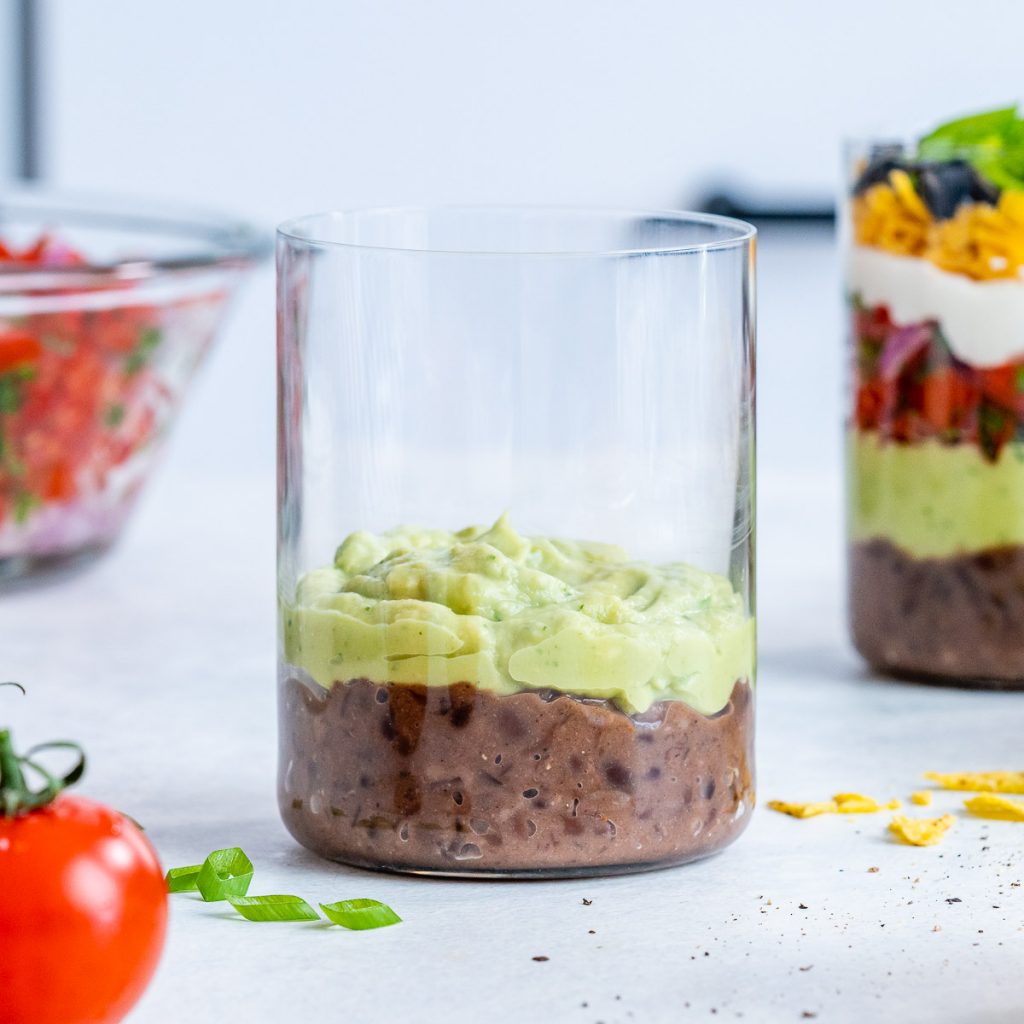 Bean and guacamole layer in seven layer dip.
