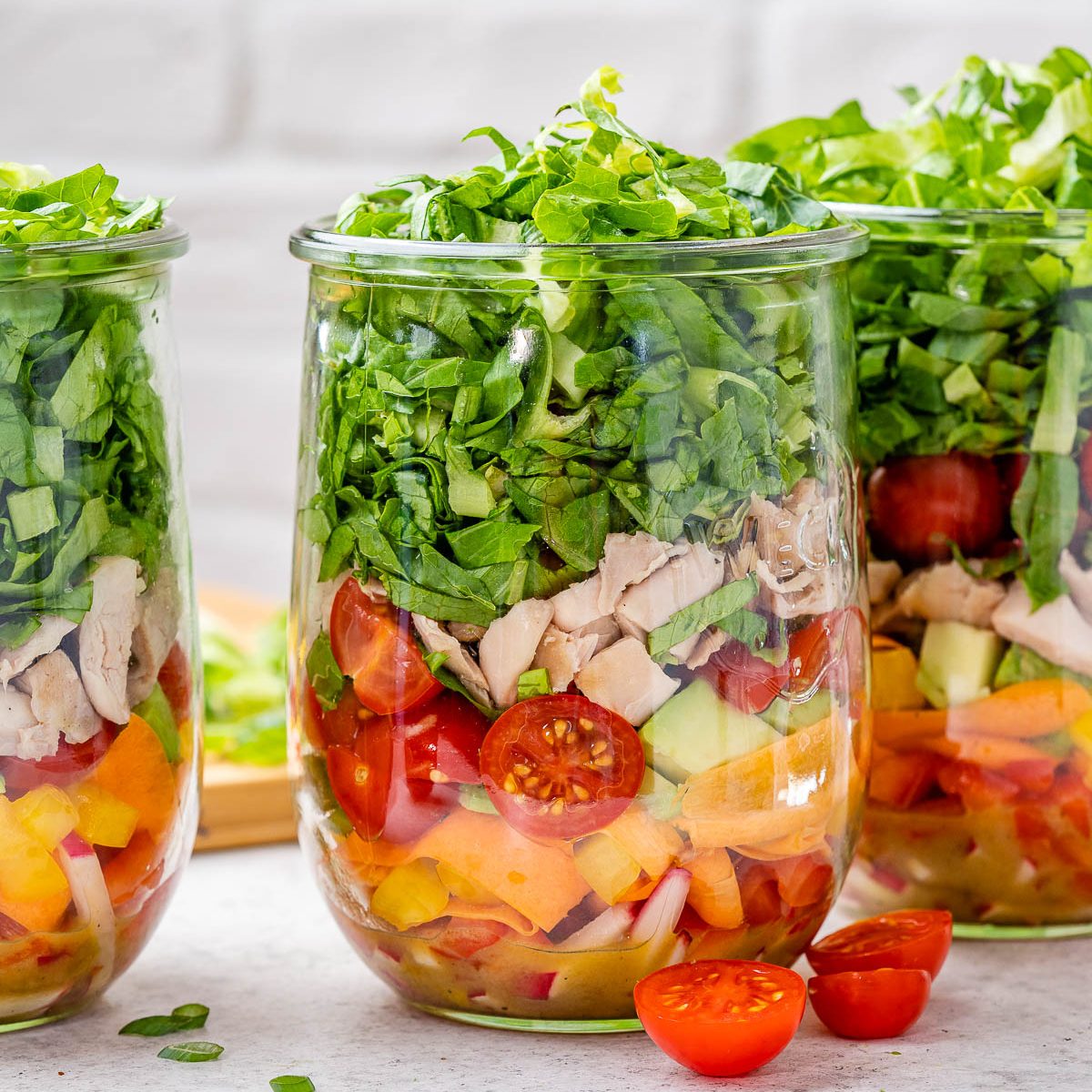 https://cleanfoodcrush.com/wp-content/uploads/2022/01/Veggie-Packed-Chicken-Salad-in-a-Jar-clean-eating-recipe-1200x1200.jpg