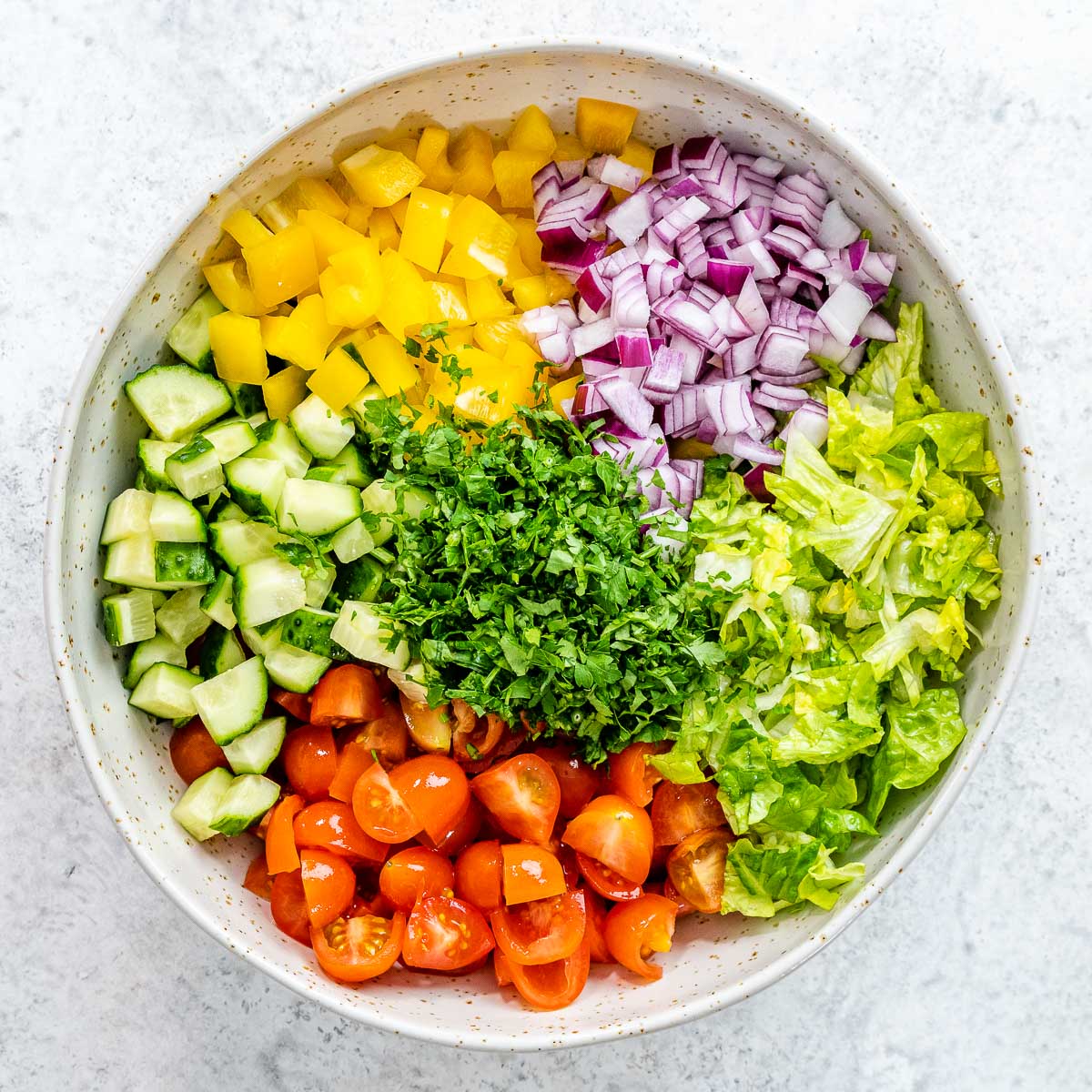 https://cleanfoodcrush.com/wp-content/uploads/2022/02/Mediterranean-chopped-salad-6.jpg