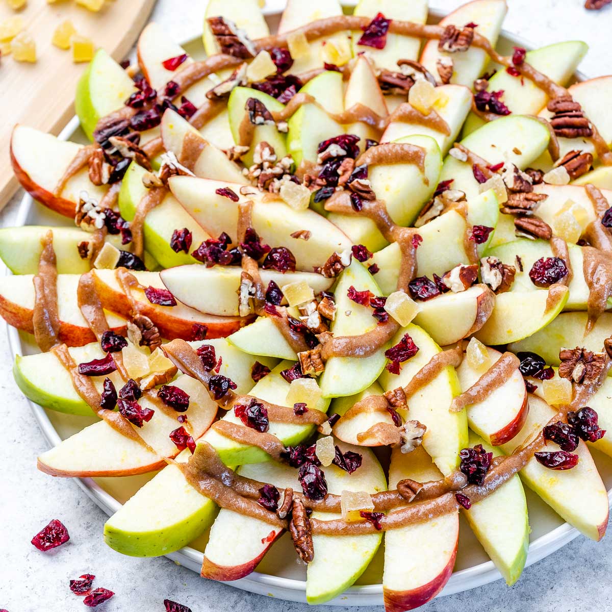 https://cleanfoodcrush.com/wp-content/uploads/2022/03/clean-eating-snack-idea-Apple-Nachos-with-Homemade-Toffee-Drizzle-recipe.jpg