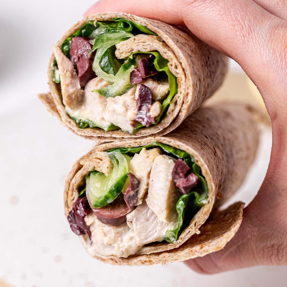 https://cleanfoodcrush.com/wp-content/uploads/2023/03/Chicken-Caesar-Salad-Wraps-1200x1200.jpg