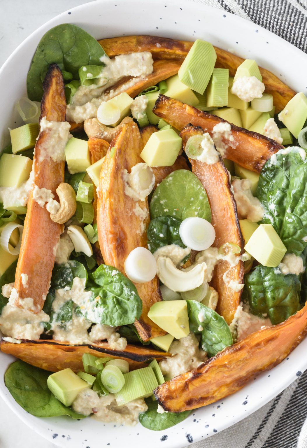 Sweet Potato + Fresh Spinach Salad with Creamy Cashew Dressing | Clean