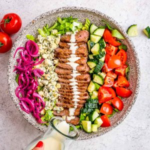 Steak cobb salad with blue cheese dressing for light lunch.
