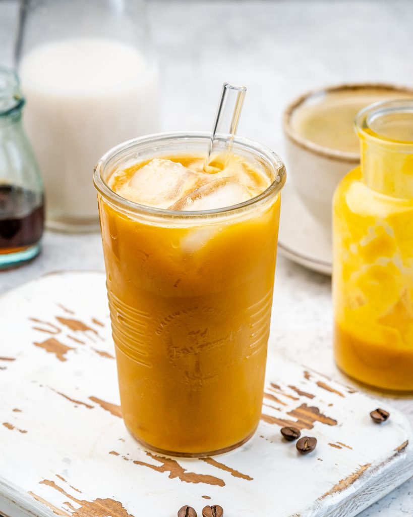 Pumpkin spice creamer being used in iced coffee.