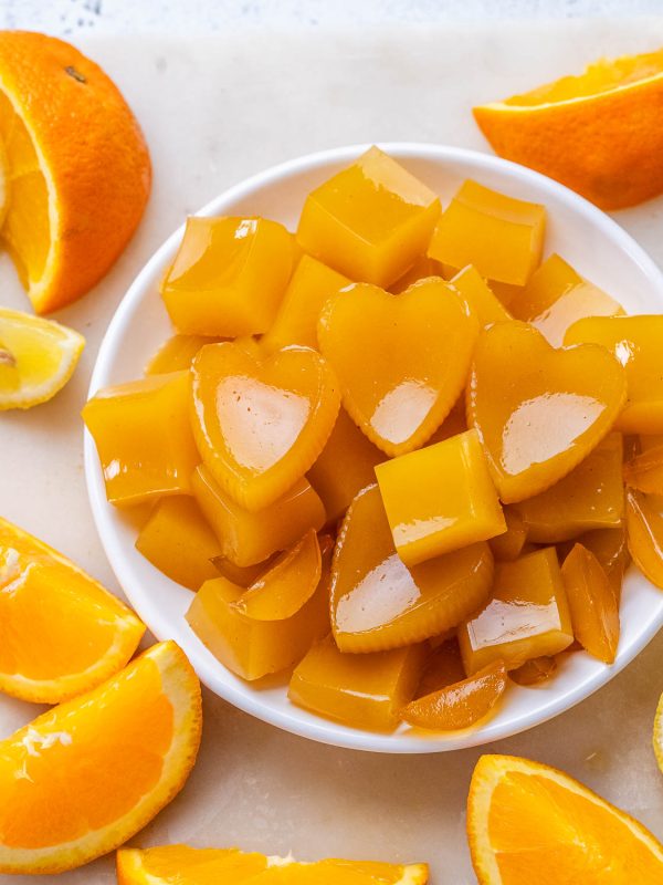 Vitamin C Immunity gummies in a white bowl.