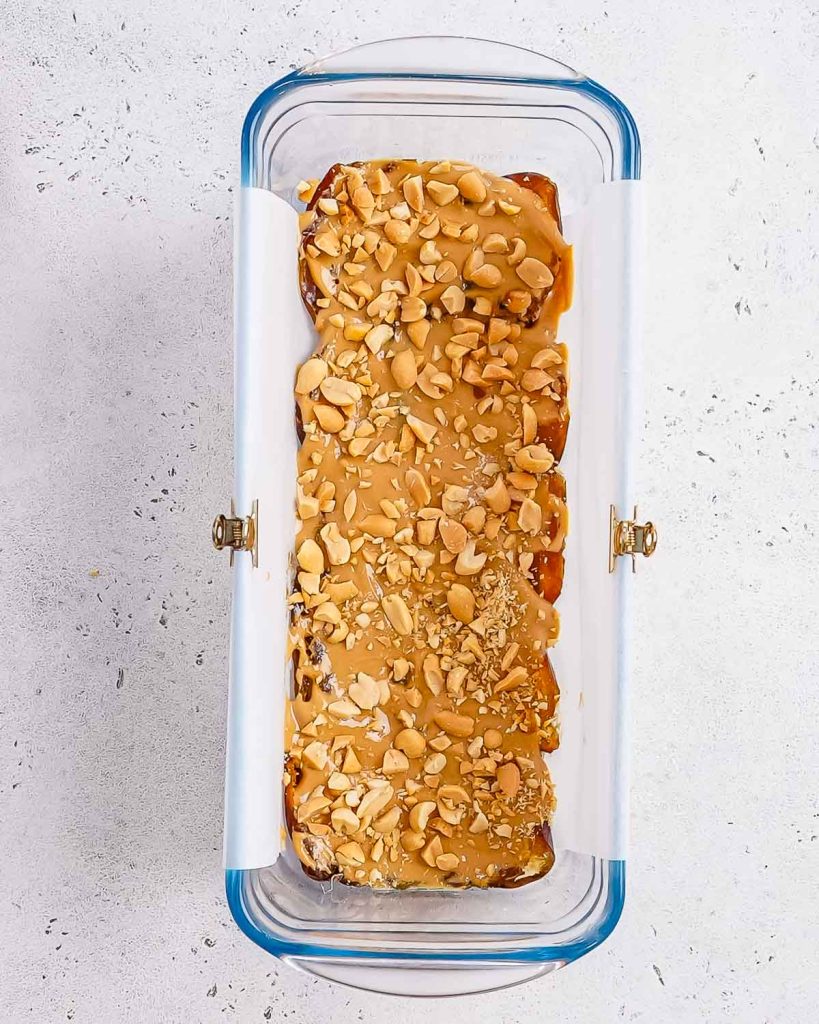 chopped peanuts sprinkled over the peanut butter in the date bark recipe.