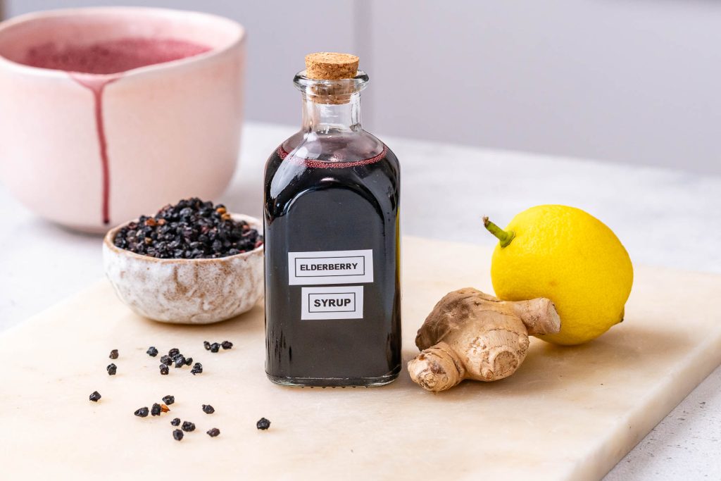 Fully made homemade elderberry syrup recipe in a bottle.