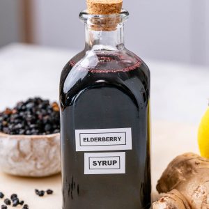 Homemade elderberry syrup as cold and flu immunity booster.