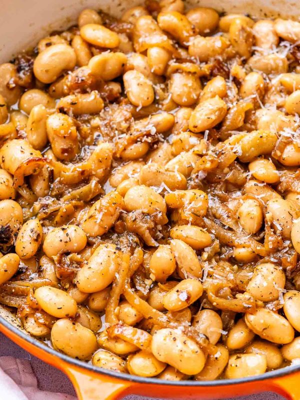 French onion butter beans in a skillet.
