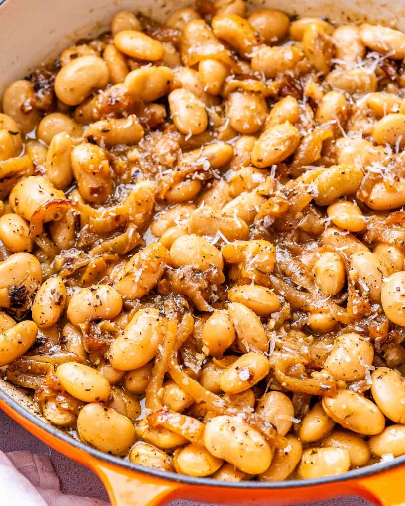 French onion butter beans in a skillet.
